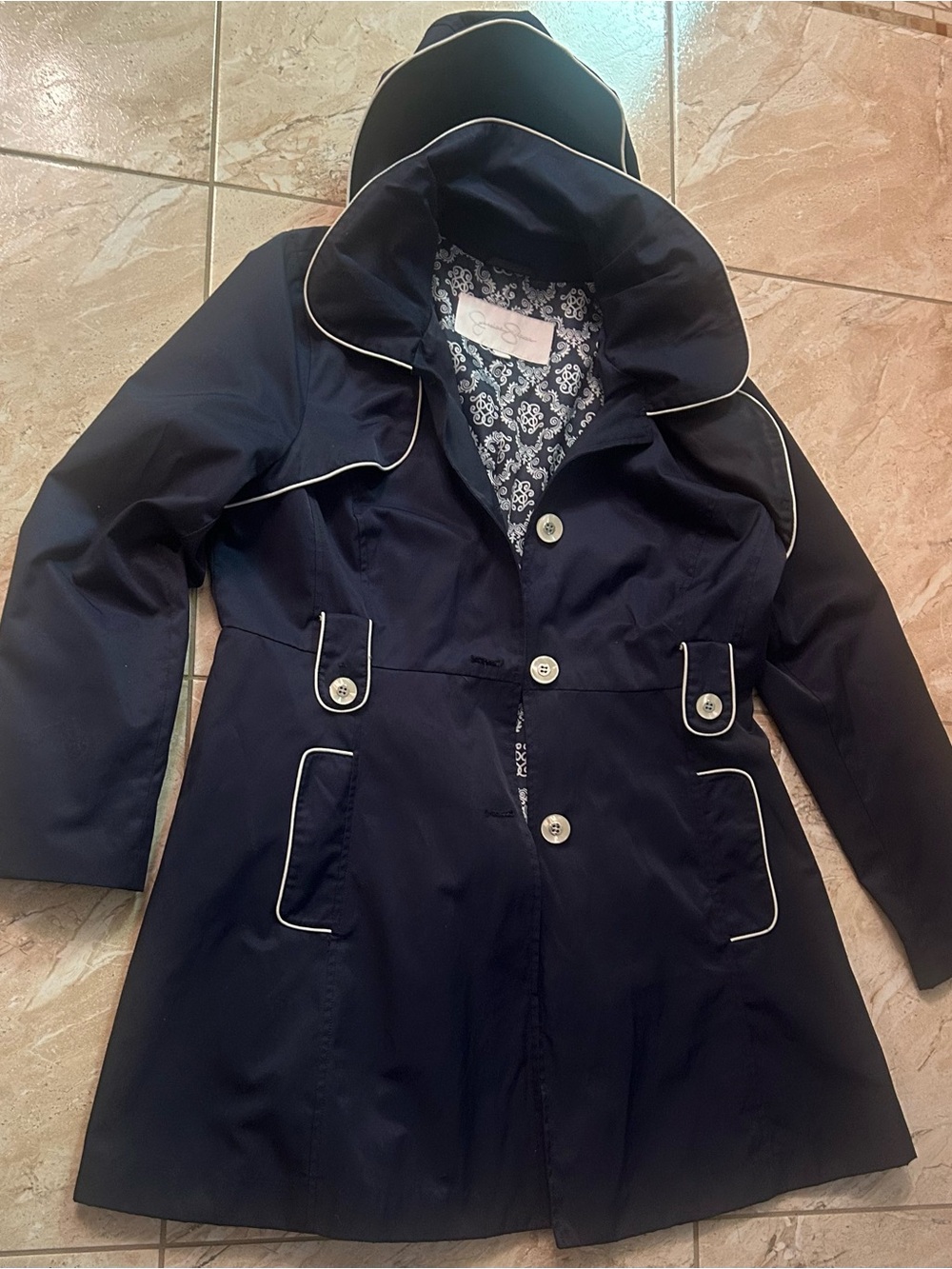 Navy Raincoat with White Piping Detail